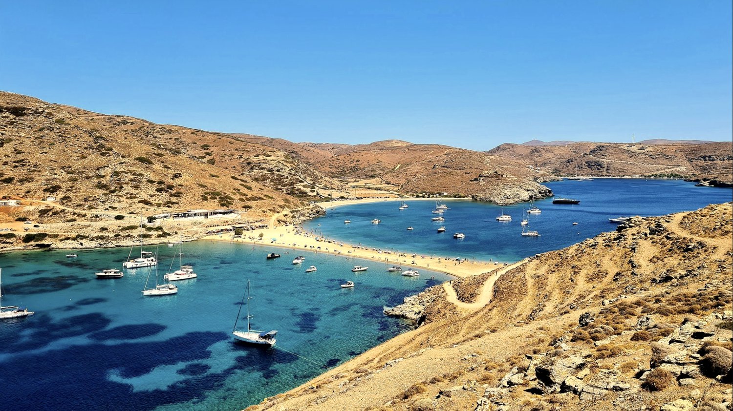 The turquoise sandbar bay of Kolona, where two seas meet, on Kythnos